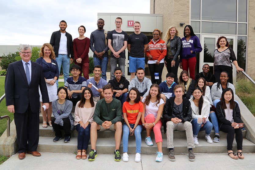 Appleton Mayor Tim Hanna (standing, left) joined Dr. Marie Martin (second row, standing), director of FVTC’s Global Education and Services, in welcoming some of this year’s international students. Appleton Mayor Tim Hanna (standing, left) joined Dr. Marie Martin (second row, standing), director of FVTC’s Global Education and Services, in welcoming some of this year’s international students.